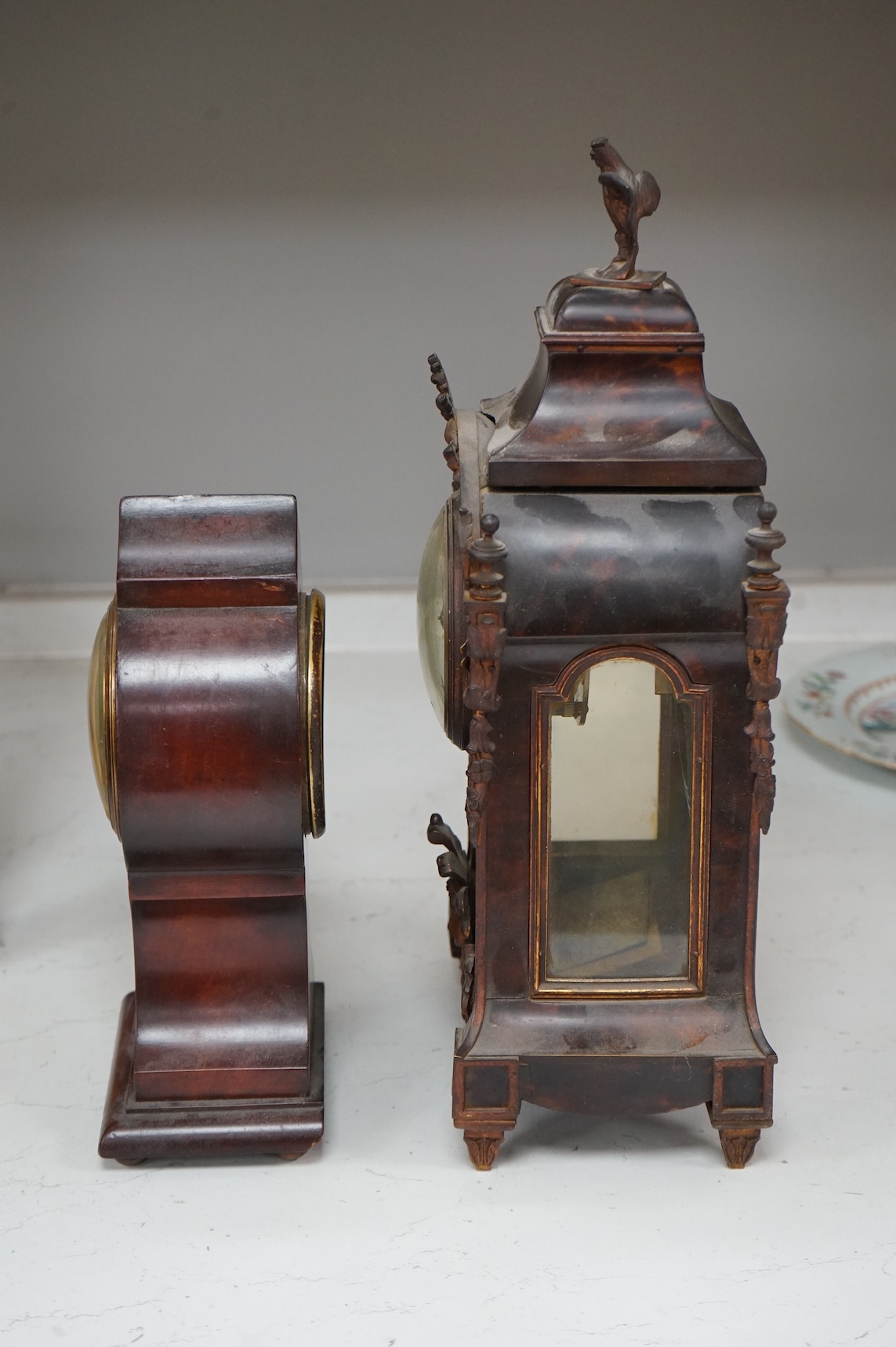 Two mantel clocks with French movements, circa 1900 to include an Art Nouveau inlaid example, largest 39cm high